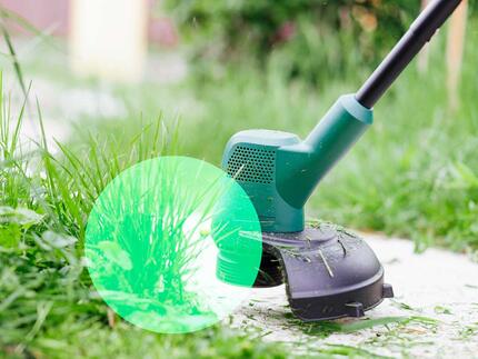 graestrimmer-test-paa-vej