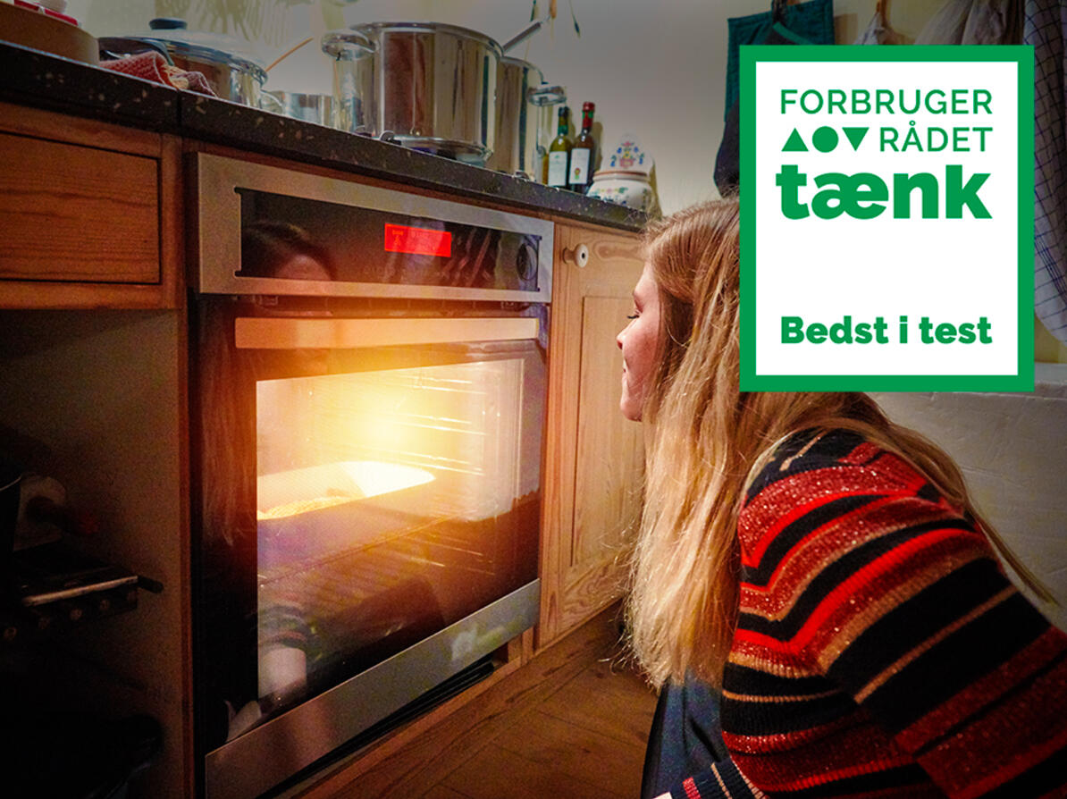 En person sidder ved en ovn og bedst i test logo