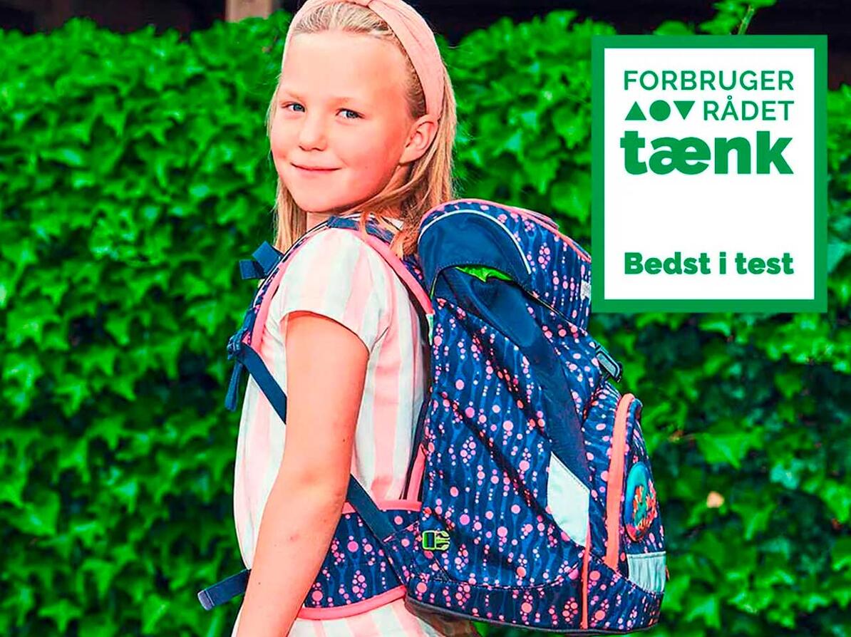 pige med skoletaske, der er Bedst i test Bedst i test-logo