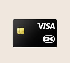 Sort betalingskort med visa og dankort logo på beige baggrund