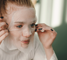 girl using facial mask
