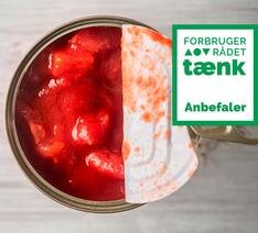 Hakkede tomater på dåse, der er halvåben, i smagstest af hakkede tomater